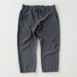Lululemon On The Fly Crop Woven Pants 23" Black Travel Lightweight Size 12